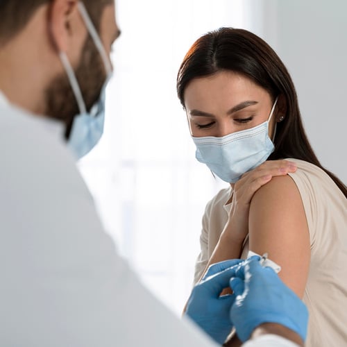 doctor-doing-vaccine-patient